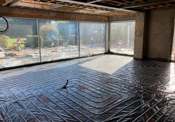 A pipe layout waiting for the liquid screed Midlands team to cover it