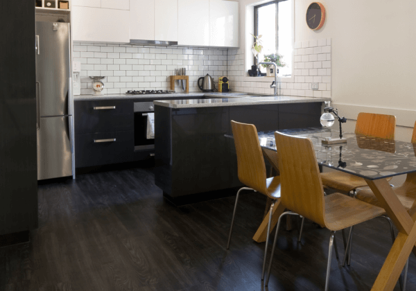 Underfloor heating flooring installed under laminate in a kitchen