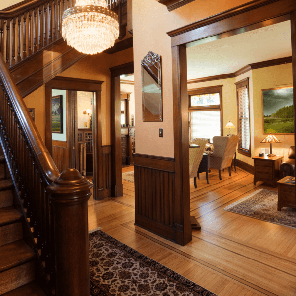 The hallway of a listed building with underfloor heating under the wooden flooring