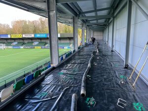 The floor of a football club statium being prepared for a liquid screed pour