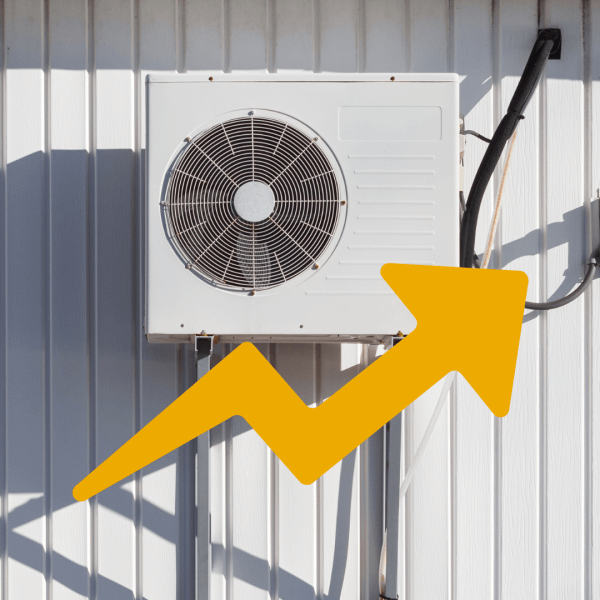 A commercial heat pump installed outside a warehouse