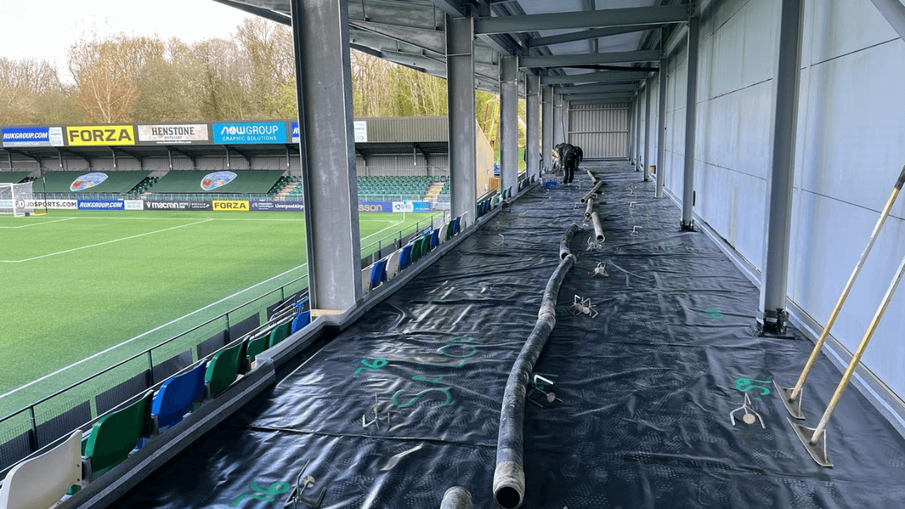 Liquid screed poured at a football stadium
