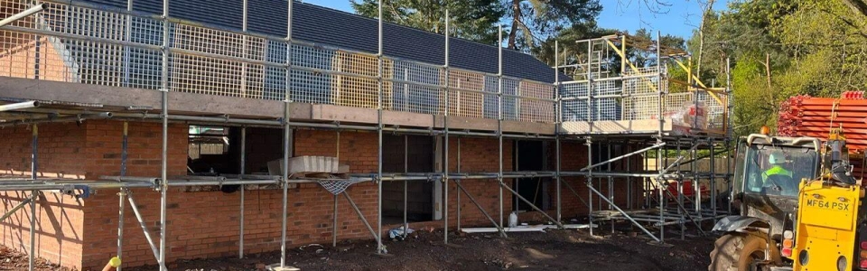 Outside of 2 bungalows mid-build
