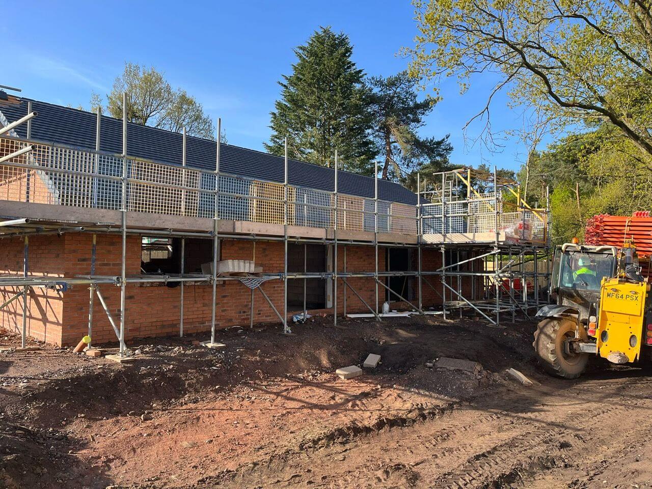 Outside of 2 bungalows mid-build