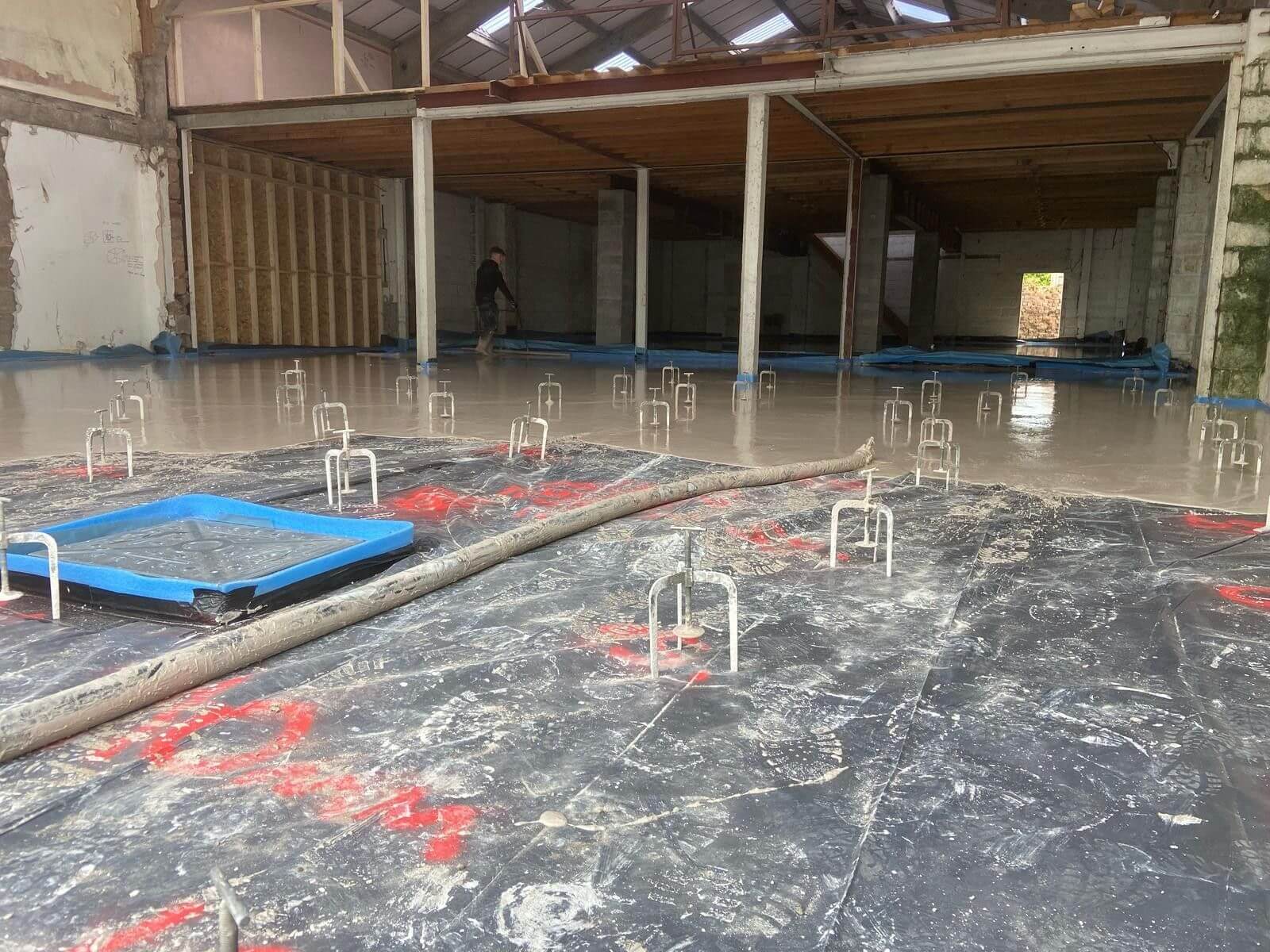 Start of the liquid screed process - commercial building in Rhyl