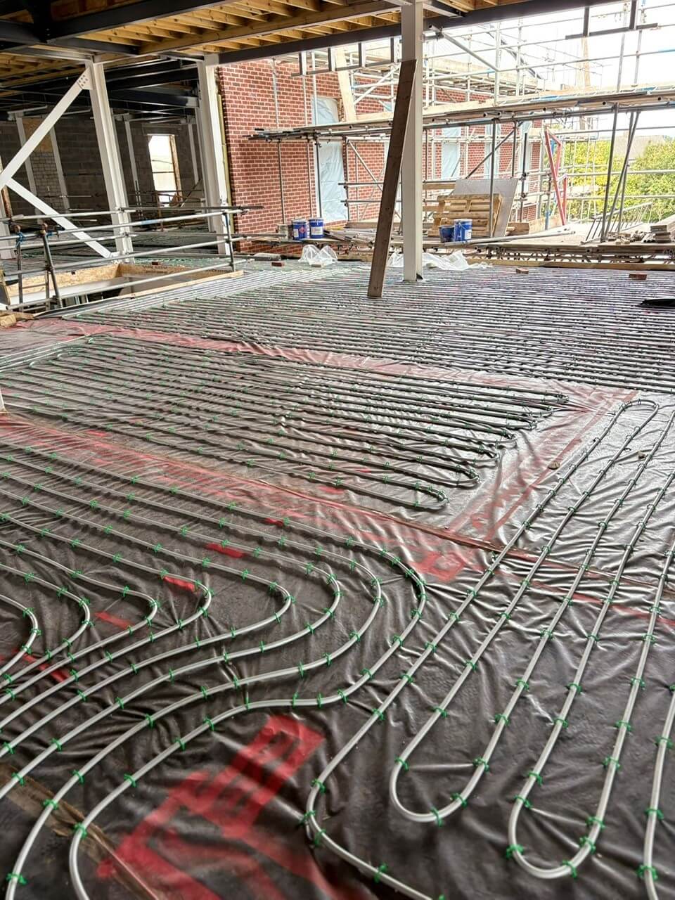 EasyFlow underfloor heating installers fitting a commercial heated flooring system in Shropshire