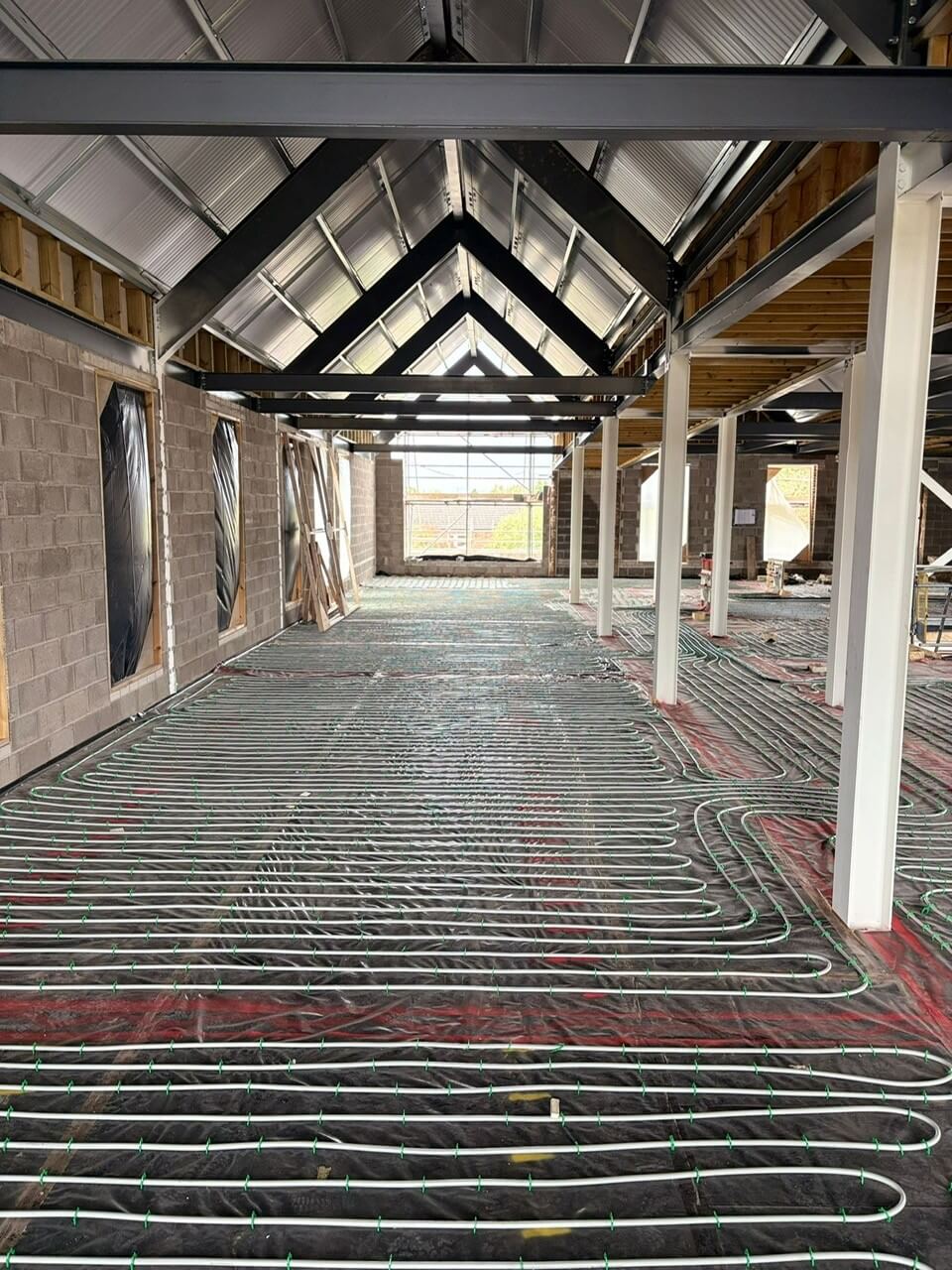 Completed layout of underfloor heating pipes ready for screeding at Leominster Health Centre