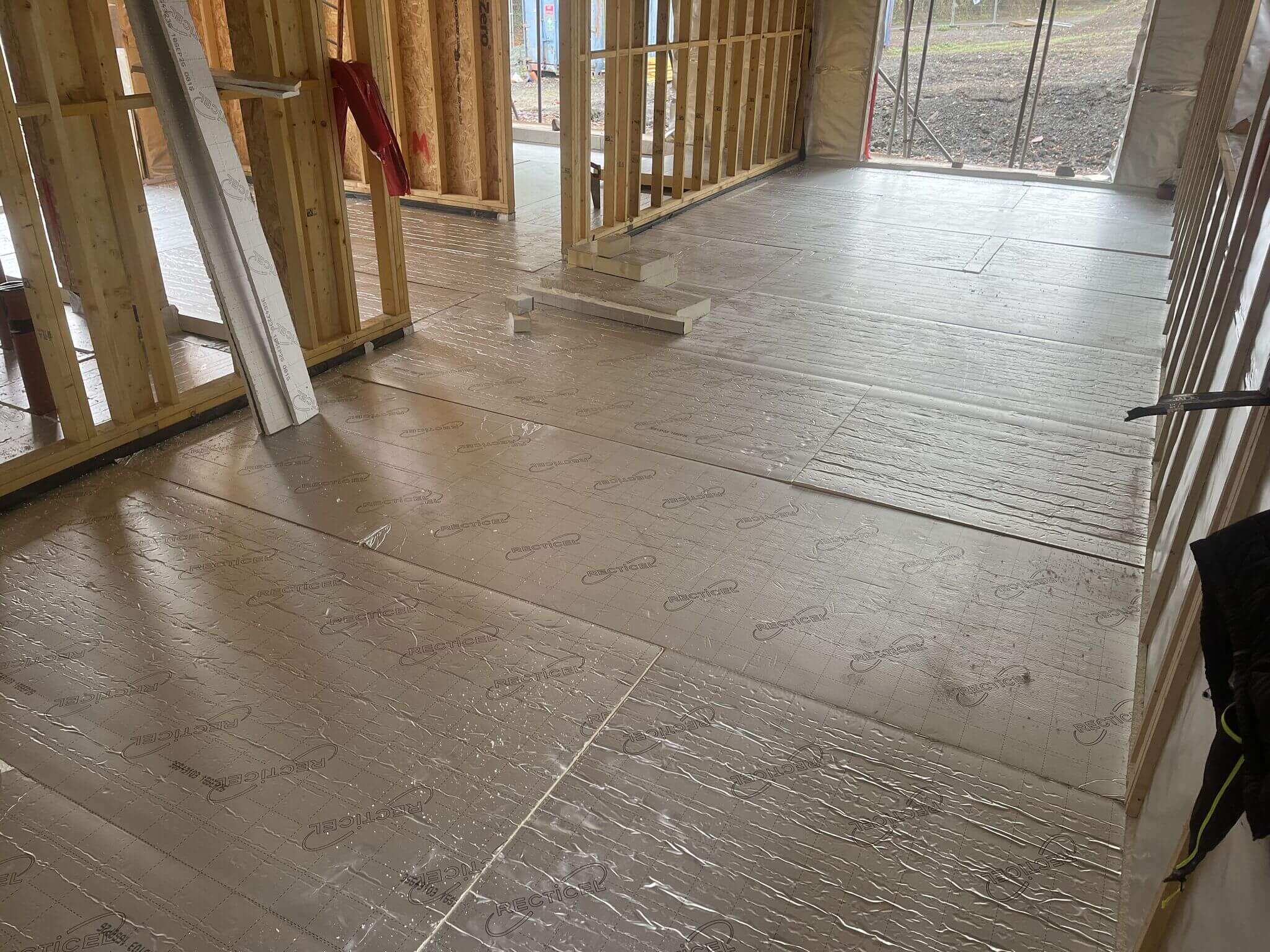 Insulation laid for underfloor heating for the most efficient way to heat a house