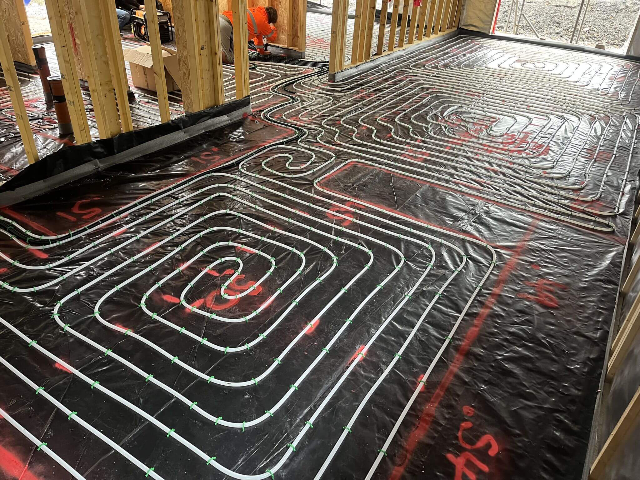 Heated flooring pipework on the ground floor of a new build home