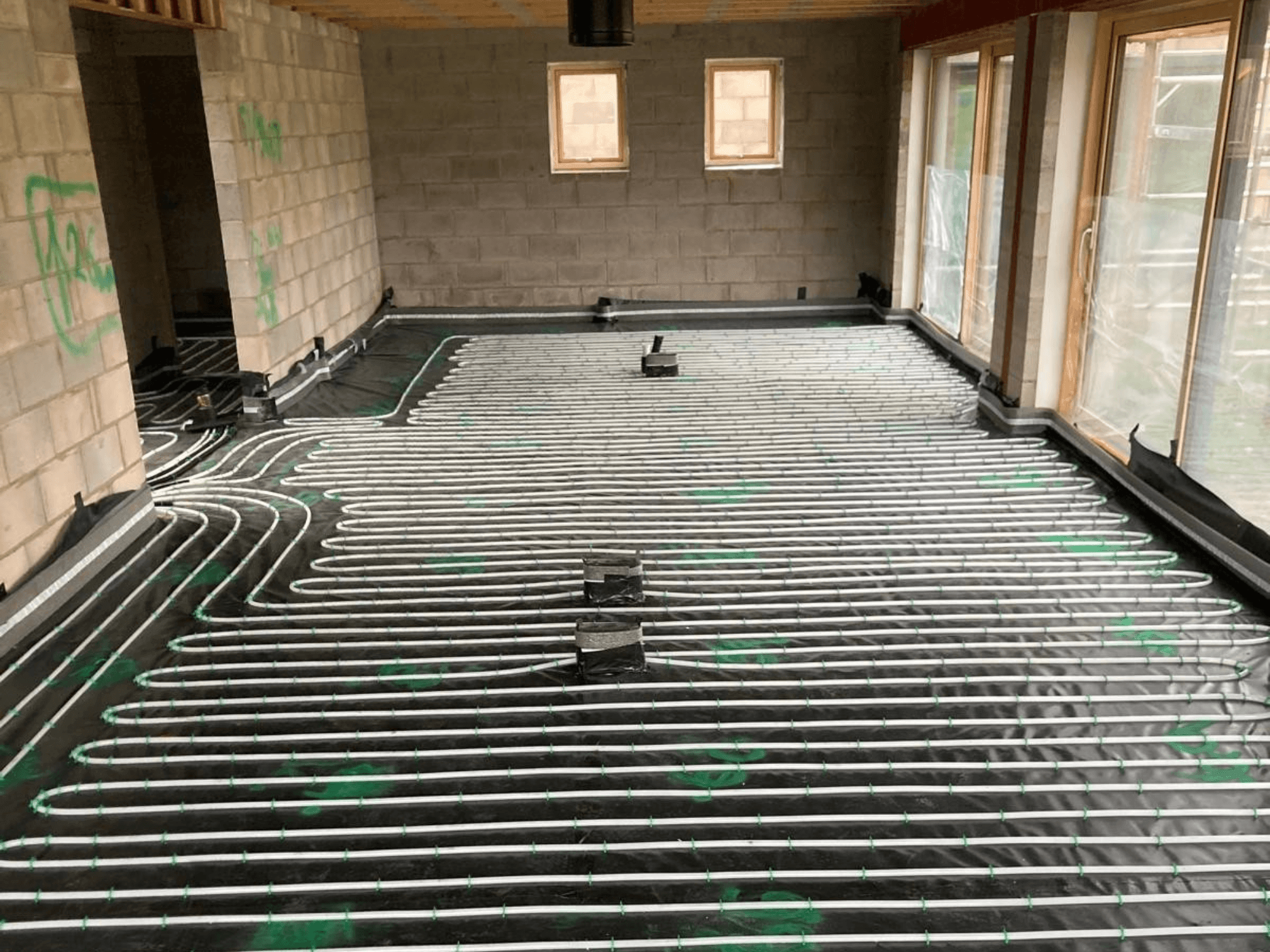 Underfloor Heating & Pumped Floor Screed for Luxury Lodge