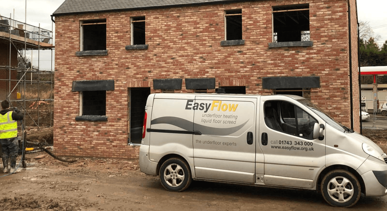 An EasyFlow truck parked outside a new build