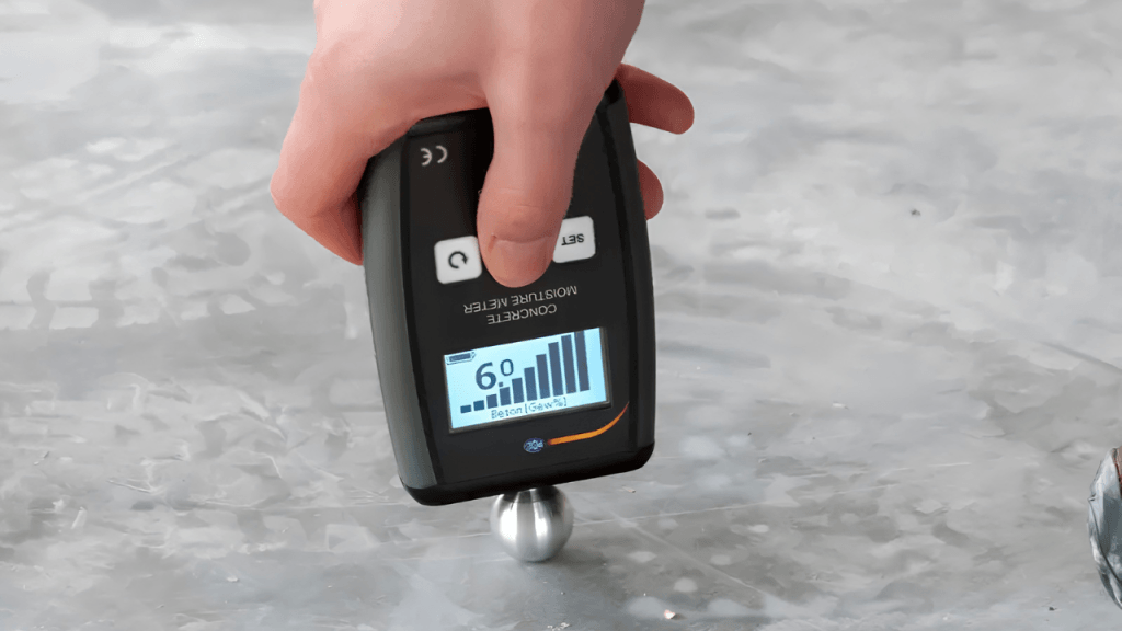 A screed moisture test with an electronic meter