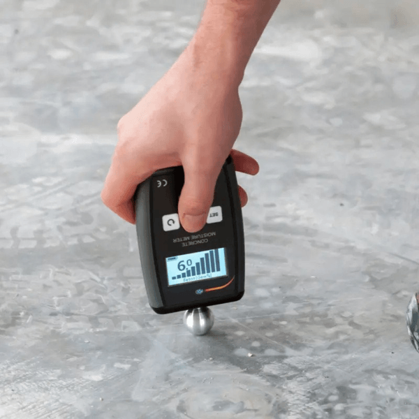 A screed moisture test on a damp floor